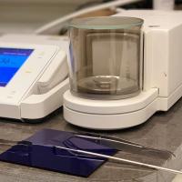 A view from the stable isotope lab showing a scale used for weighing samples.